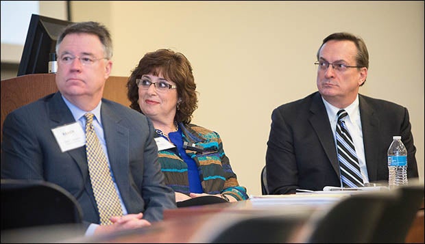 Panel members included, left to right, ECU physician Herb Garrison, ECU nursing professor Donna Lake and AMA representative Richard Hawkins.