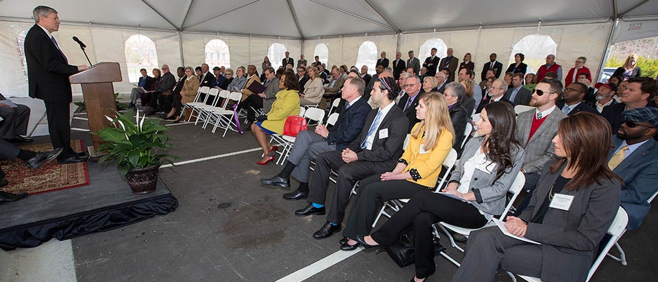 Pictured above, a crowd gathers to celebrate the opening of the ECU Dental Community Service Learning Center in Lillington.