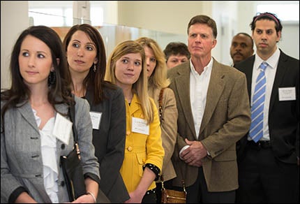 Listening intently during a tour of the new Lillington dental community service learning center are dental students Meagan Maida, 3rd year; Elizabeth Price, 2nd year; Caitlin Miller, 1st year; Caitlin's parents Gail and Vinnie Miller; N.C. Rep. Robert Reives; and 2nd year dental student Kevin Patel.