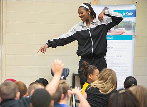 ECU basketball player Janesha Ebron responds to the students' questions about sports injury prevention.