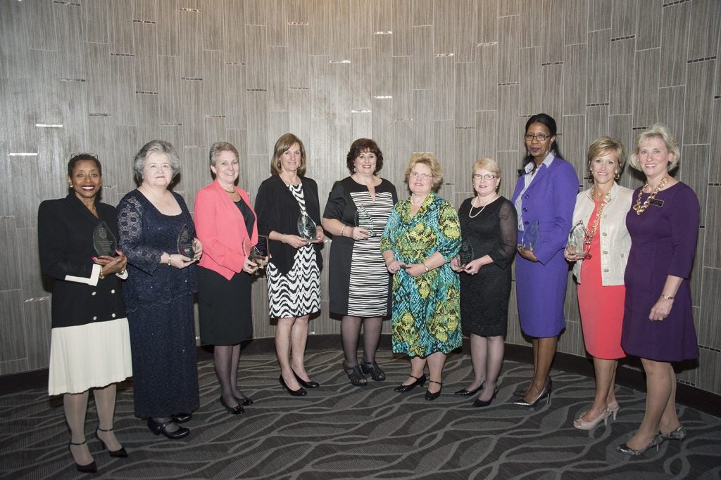 2016 Hall of Fame inductees, from left, Sandra Smith, Sue Edwards, Wendy Leutgens, Jane Pearson, Donna Lake, Janice Neil, Annette Peery, Mary Chatman and Gina Woody, with Dean Sylvia Brown.