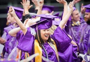 ECU graduates celebrated their accomplishments at commencement despite the rainy and chilly conditions. (Photo by Jay Clark, University Communication)