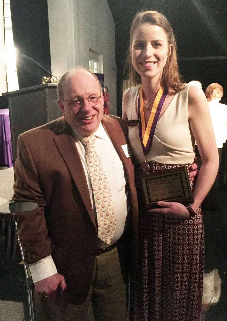 Woolard poses with Dr. Michael F. Bassman, for whom the award is named. (Contributed photo)