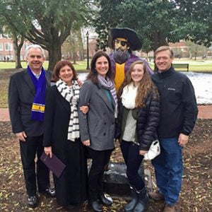 ECU student Madigan Raper, fourth from left, with grandfather Bill Pearson, grandmother Sandra Solomon, mother Michelle Pearson, and father Steve Raper, on campus during a preview day for the Honors College. (Contributed photo)