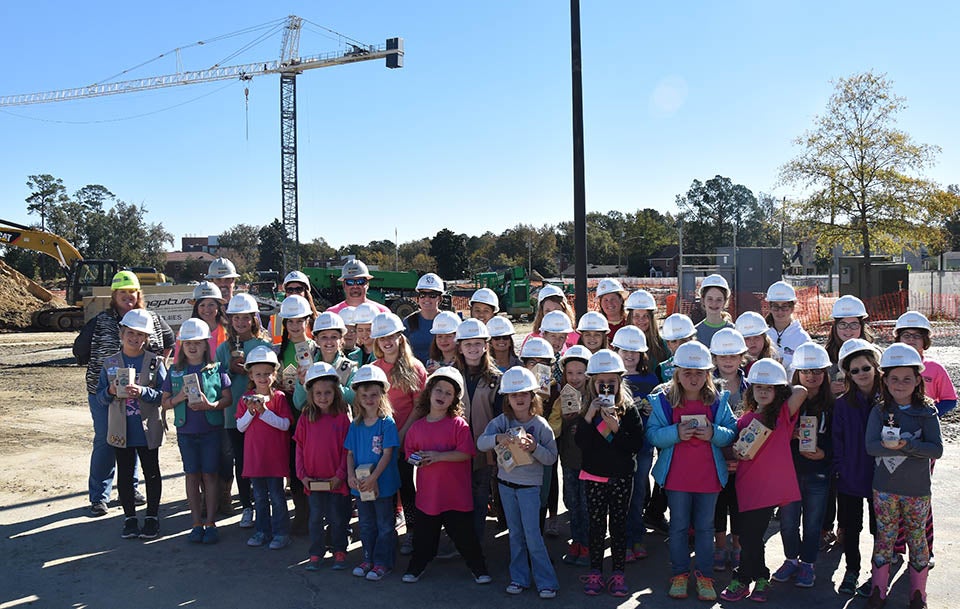 The scouts and their leaders pose for a photo after their day of fun.