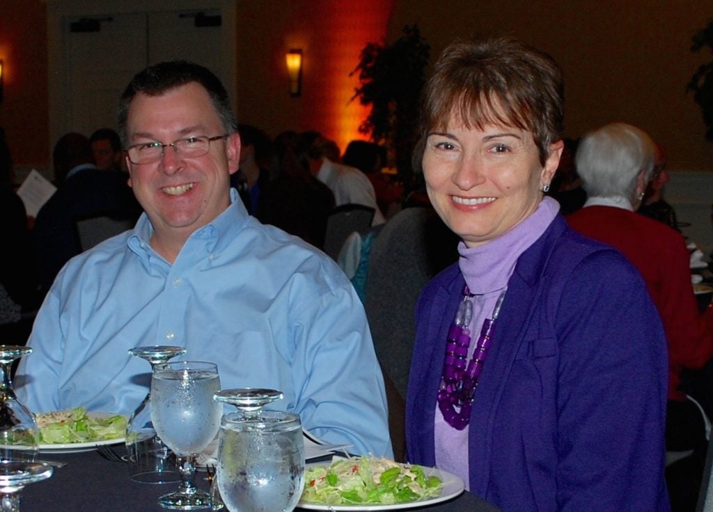Dr. R. Todd Watkins and Dr. Geralyn Crain, both faculty in ECU's School of Dental Medicine, enjoy this year’s Author Recognition Awards Ceremony. (Photo by Peggy Novotny)