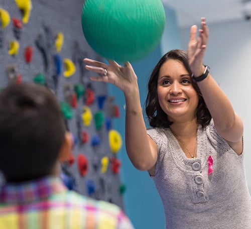 Ferrufino-Sosa, a breast cancer survivor, and her eight-year-old son Daniel." title="Ferrufino-Sosa, a breast cancer survivor, and her eight-year-old son Daniel.