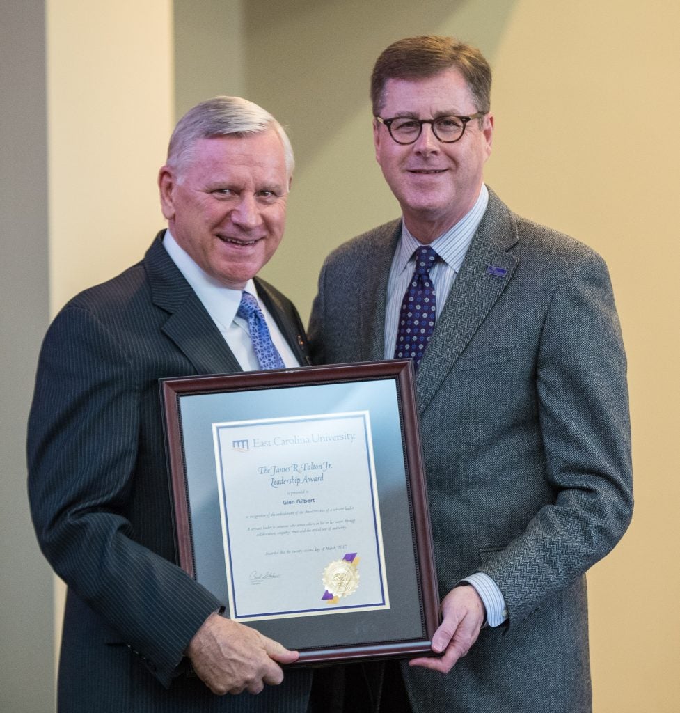 Dr. Glen Gilbert, dean of the College of Health and Human Performance, receives the James R. Talton Leadership Award from Chancellor Cecil Staton. (Photos by Cliff Hollis)