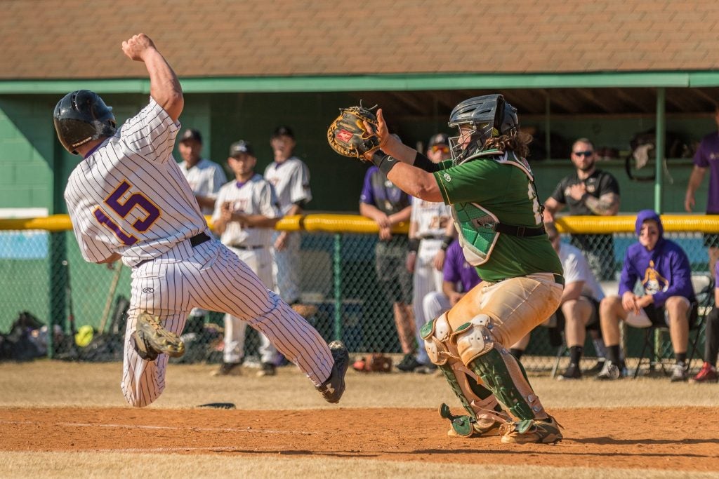 Stephen Allard slides into home against William and Mary.