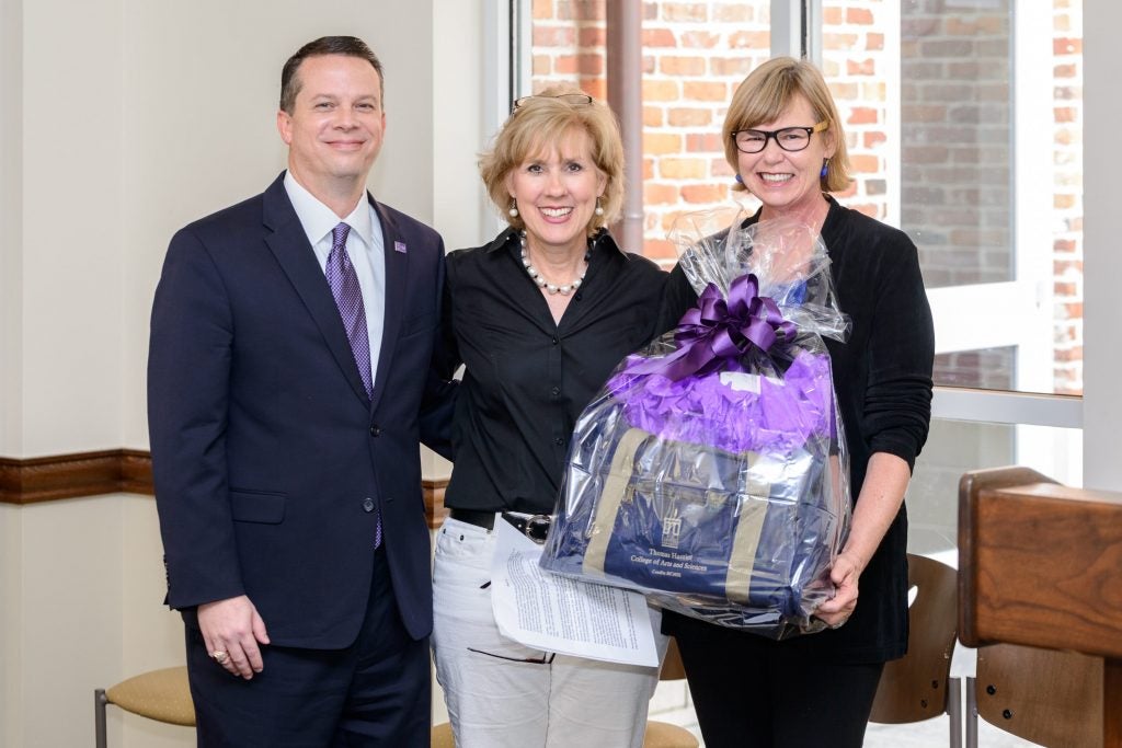 Dean William M. Downs (left) poses with Junior Staff Excellence Award winner, Beverly Estorge (center), and Cindy Mills (right), from the Department of Economics, at the inaugural THCAS Staff Awards and Recognition Ceremony. (Photos by Rob Taylor Photography & Design.)