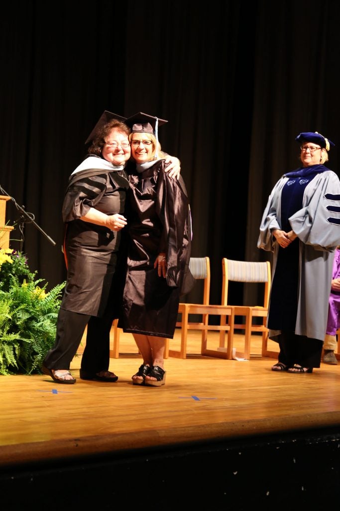 ECU faculty member Rose Sinicrope, left, and master’s graduate Anita Koen celebrate at the departmental graduation on May 6. (Contributed photos) 