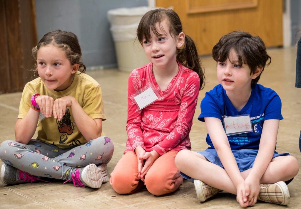 Children in a K-2 Drama Camp class participate in a story during camp. (Photo by Rhett Butler)