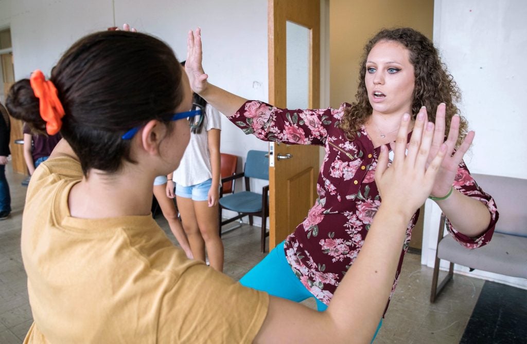 Drama Camp instructor Rachel Hutzenbiler works on an improvisation exercise at the Messick Theater Arts Center on Monday, July 17, 2017. (Photo by Rhett Butler)
