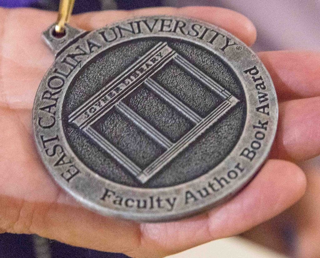 Joyner Library book author medallion.