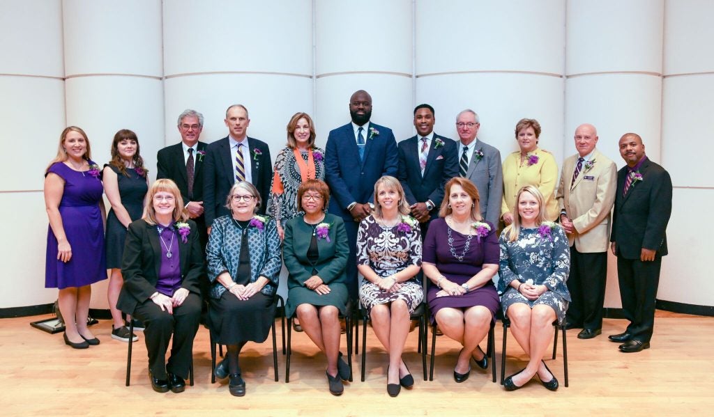 Members of the 2017 class of inductees to the ECU College of Education Educator’s Hall of Fame include, back row, from left to right, Megon Ann Clayton, a representative of the late Regina Figueiredo-Brown, Joseph B. Atkins, Lawrence Jay Hodgkins, a representative of the late Miriam Grace Sexton Mitchell, Rodney Lynn McNeill, a representative of the late Ernest Roy McNair, Jr., Edison Earl Watson, Sharon Harris Floyd, Michael Landreth Donnell and Alan R. Bailey. Front row, from left to right, Karen Catoe Meetze, Sarah DeRitter Mitchelson, Sandra Kay Eldridge, Tara Wooten Parker, Cindi Branch Brown and Dionna Leigh Draper Manning. (contributed photo)