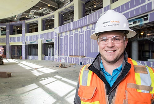 ECU graduate Jason Knoernschild '13 is a project engineer on the new Vidant cancer center being built next to ECU's health sciences campus.