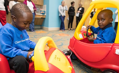 Elijah (left) and Daniel play together.