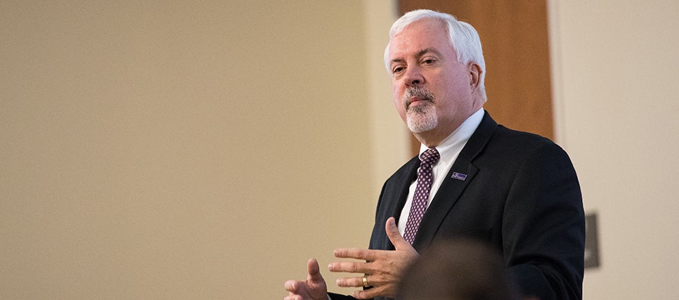 Dr. Rick Niswander, Vice Chancellor of Administration and Finance explains the suggested tuition and fees increase to board members.