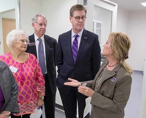 Dr. Sharon Gordon, associate dean for research, leads a tour of the new dental facility.