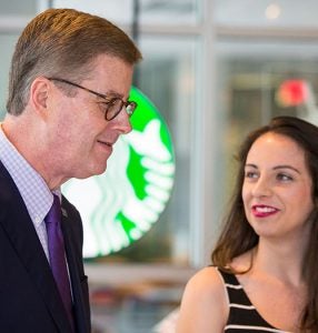 Chancellor Cecil Staton talks with Maggie Stewart, a rising junior, while waiting in line at Starbucks.