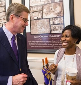 Dr. Virginia Hardy and Chancellor Cecil Staton share a laugh during his welcome breakfast Friday morning.