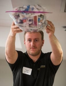 Medical student Tatum Lemley prepares to drop his team's egg.