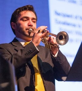 Gabe DiMartino from the ECU School of Music provides a musical interlude on the trumpet.