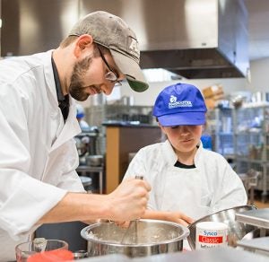 Jared Lowe and Makayla Kean whip up a batter.