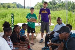 Jared Lowe counsels attendees at the day camp.