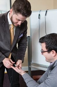 Dr. Matt Fish illustrates the biofeedback measurement tools used in his research examining the physiological effects of talking about romantic relationship problems.