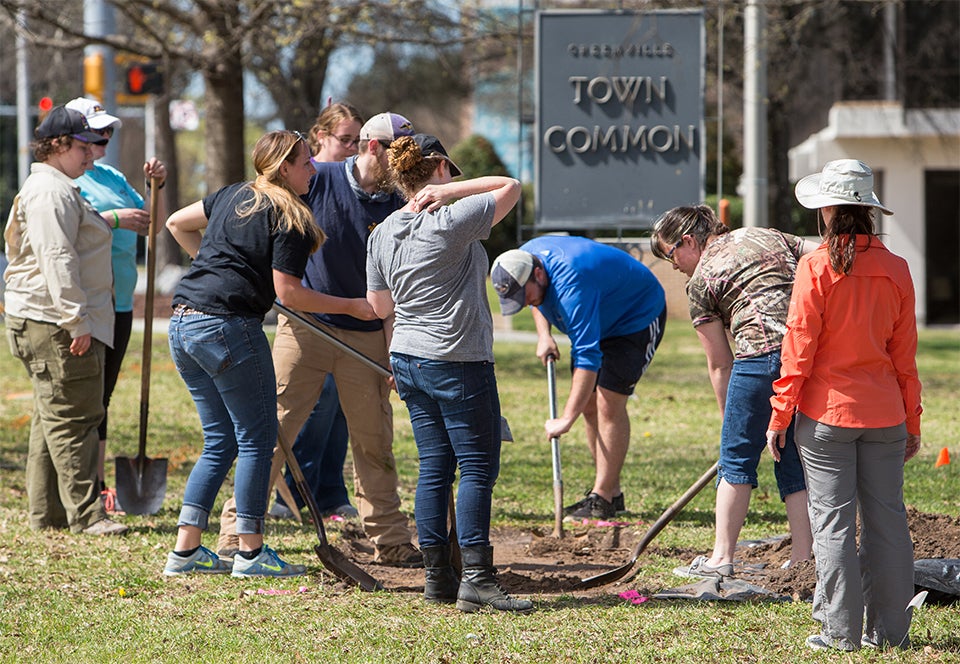 Archaeology students excavate a trench in search of the foundation of Sycamore Hill Missionary Baptist Church.