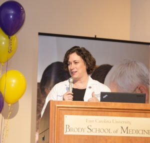 Dr. Danielle Walsh, associate professor of surgery, delivered the keynote address at Friday’s white coat ceremony for the Brody School of Medicine.