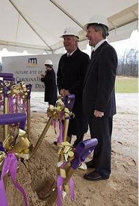 Bob Greczyn, left, chairman of the ECU board of trustees, and Dr. Steve Ballard, ECU chancellor, enjoy the preparations for the ceremonial groundbreaking of the new ECU School of Dentistry Feb. 22. Photo by Cliff Hollis