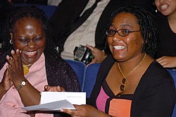 Paulette Smith, left, celebrates after learning her daughter, Kitila Smith, will pursue a residency in obstetrics and gynecology at Western Pennsylvania Hospital in Pittsburgh. Photo by Doug Boyd