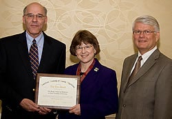 From left, Dr. Kenneth Steinweg, interim chairman of family medicine at ECU; Dr. Janice Daughtry, associate professor of family medicine; and Dr. Dan Ostergaard, vice president for professional activities at the American Academy of Family Physicians, pose