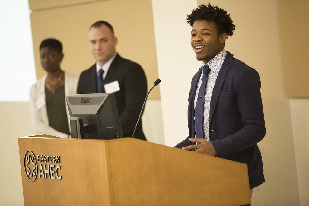 Senior education major Tristan Hunter speaks at a luncheon in Greenville for Golden LEAF Scholars.