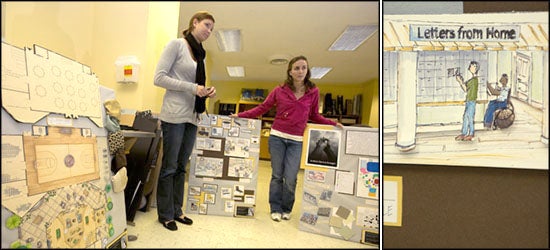 Rebecca Rotella, left, and Michelle Hamilton discuss their designs for Wounded Warrior barracks. A mailroom is a feature in the common area. Photos by Cliff Hollis.