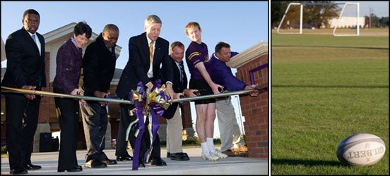 ECU Chancellor Steve Ballard, center, and university student and administrative representatives cut the ribbon Oct. 30 to open officially the North Recreational Complex.