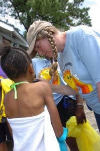 Jacque Sauls, right, a therapeutic recreation specialist with the Department of Pediatrics' hematology/oncology section, helps organize camps for children with sickle-cell disease, cancer, hemophilia and other blood diseases. Photo by Cliff Hollis