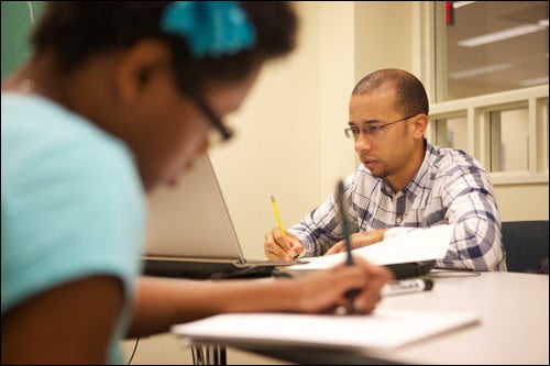 Gordon Beverly III, right, left a teaching job at D.H. Conley High School to pursue an additional degree in engineering at ECU.