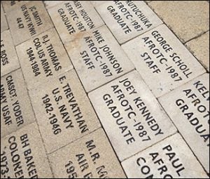 Pavers on the ECU Memorial Walk honor individuals who have served in the military.