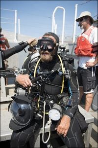 ECU alumnus John Bright prepares to dive during the search for the shipwrecks. (Photo by John McCord, Coastal Studies Institute)