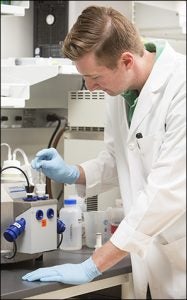 Post-doctoral scholar Terence E. Ryan conducts research at the fourth floor open laboratory at the East Carolina Heart Institute.