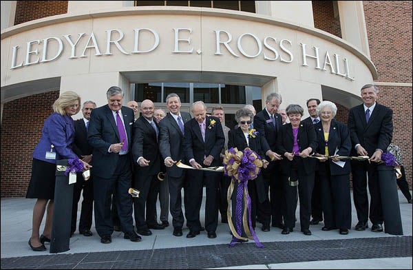 East Carolina University officials gather for the official ribbon cutting ceremony Oct. 12 to open Ledyard E. Ross Hall, where the School of Dental Medicine will reside. 