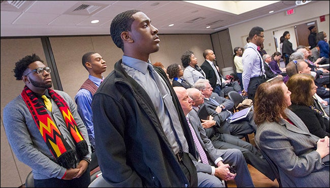 Approximately 25 students remained standing during the presentation to the board by ECU student Tyree Barnes, who presented concerns about naming the Aycock residence hall.