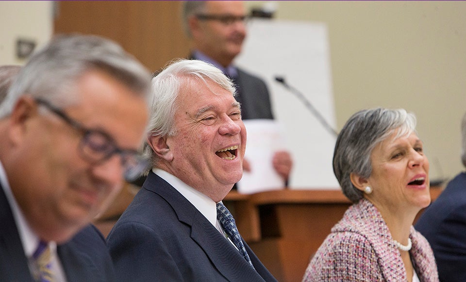 Pictured below, UNC board member w. Louis Bissette Jr., center, enjoys a light moment during the meeting. (Photo by Jay Clark)