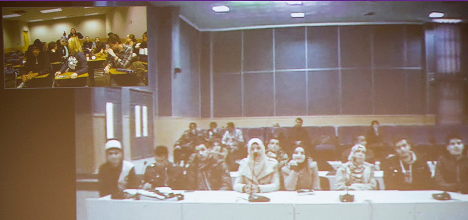 Pictured below, a screen at the ECU Global Classroom shows the students from Algeria, with the ECU class shown in the upper left.
