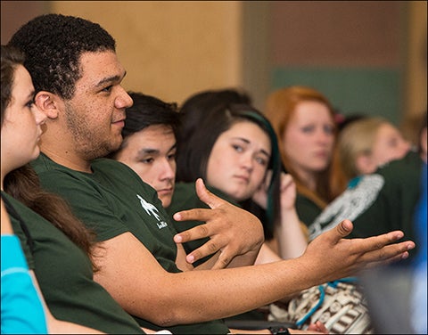 Brandon Standley, a student at Kinston High School, asks a question during a presentation by ECU professors Jamie DeWitt and Eban Bean.