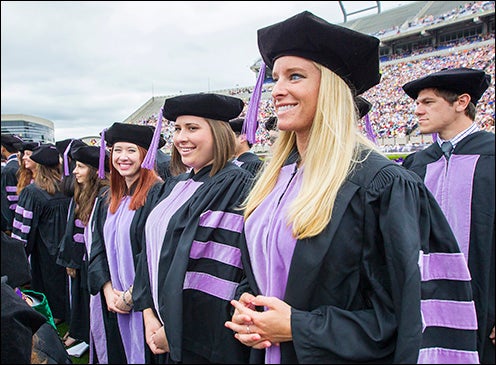 This year's commencement ceremony included the first graduating class from the ECU School of Dental Medicine, pictured above. At far right is Christin A. Carter of High Point, who plans to serve residents of Surry County as a public health dentist.