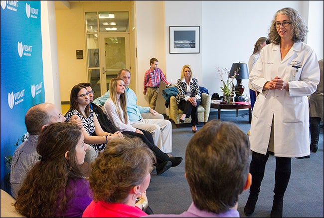 Pictured below, Dr. Morgan speaks with the families of donors and recipients who gathered for the press conference.